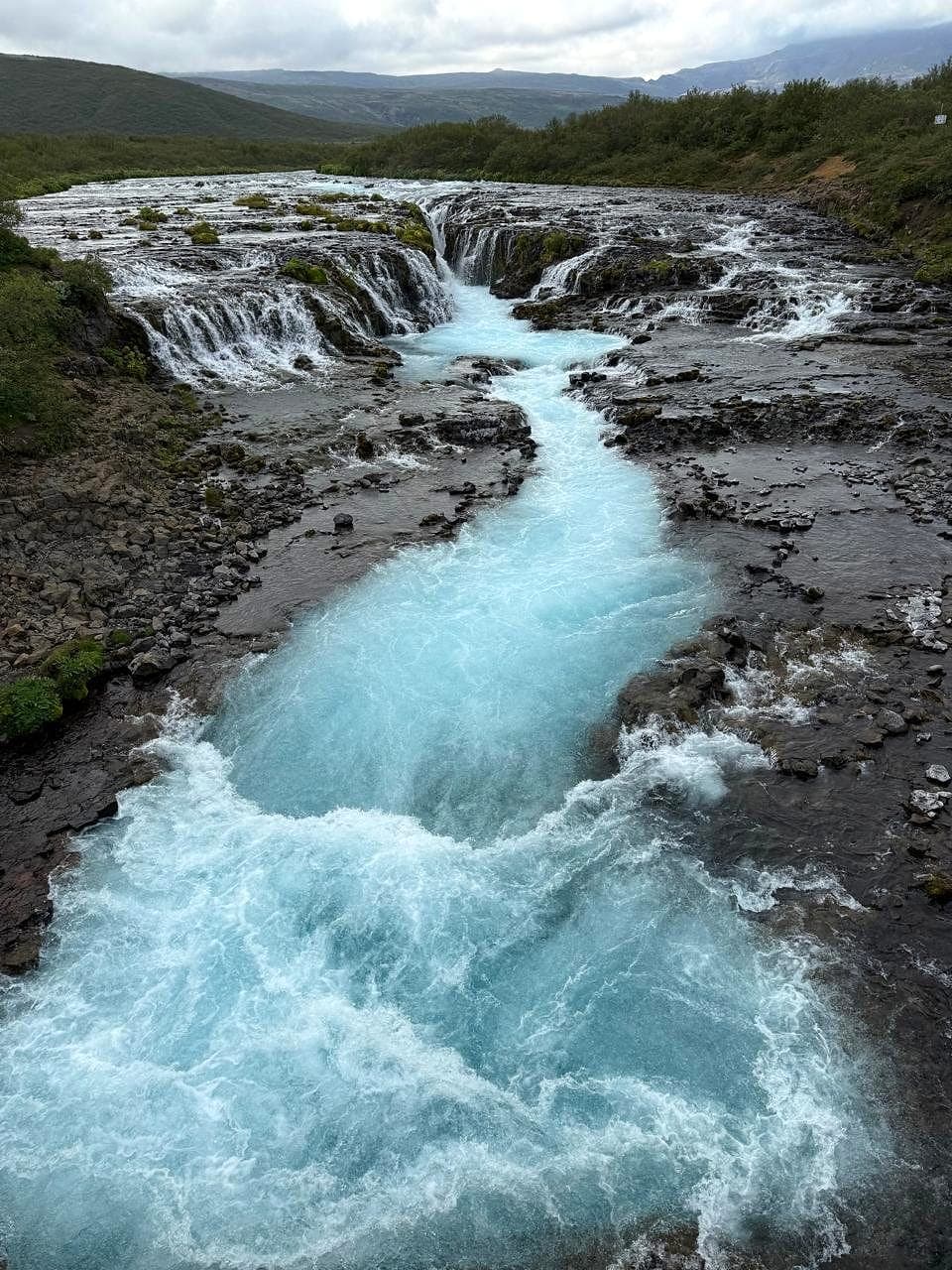 Brúarfoss blue waterfall
