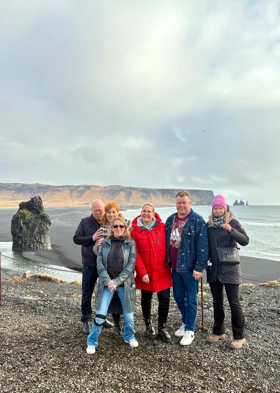 Guests at the black sand beach